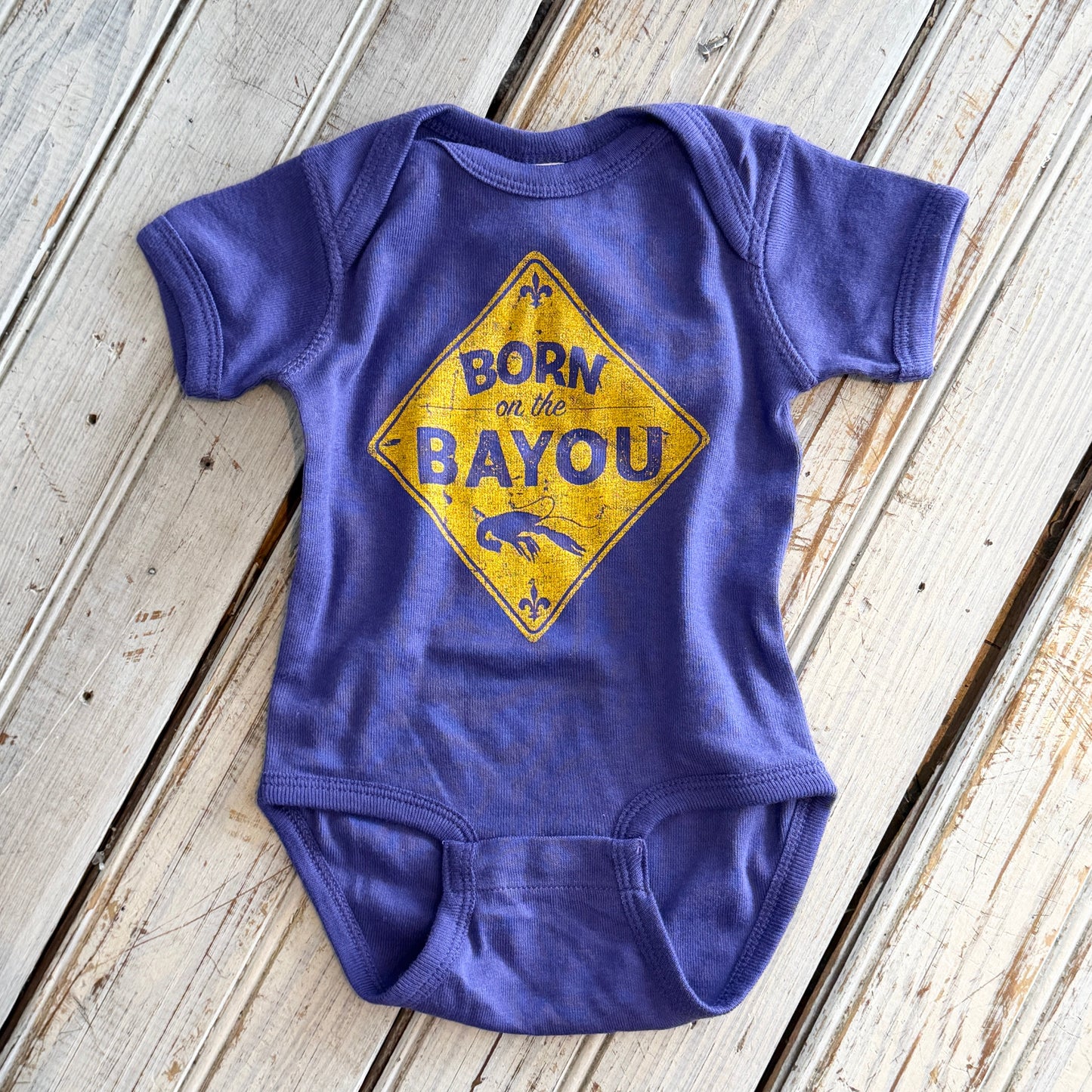 Born on the Bayou Onesie-purple